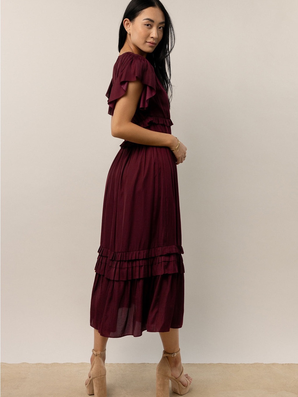 Bohme Maroon Ruffle Willa Midi Dress features a V-neckline and tiered skirt. L - Picture 2 of 12